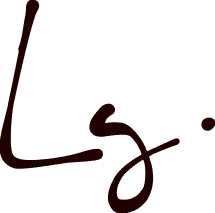 Logo typographique manuscrit « Lg » en brun foncé sur fond transparent.